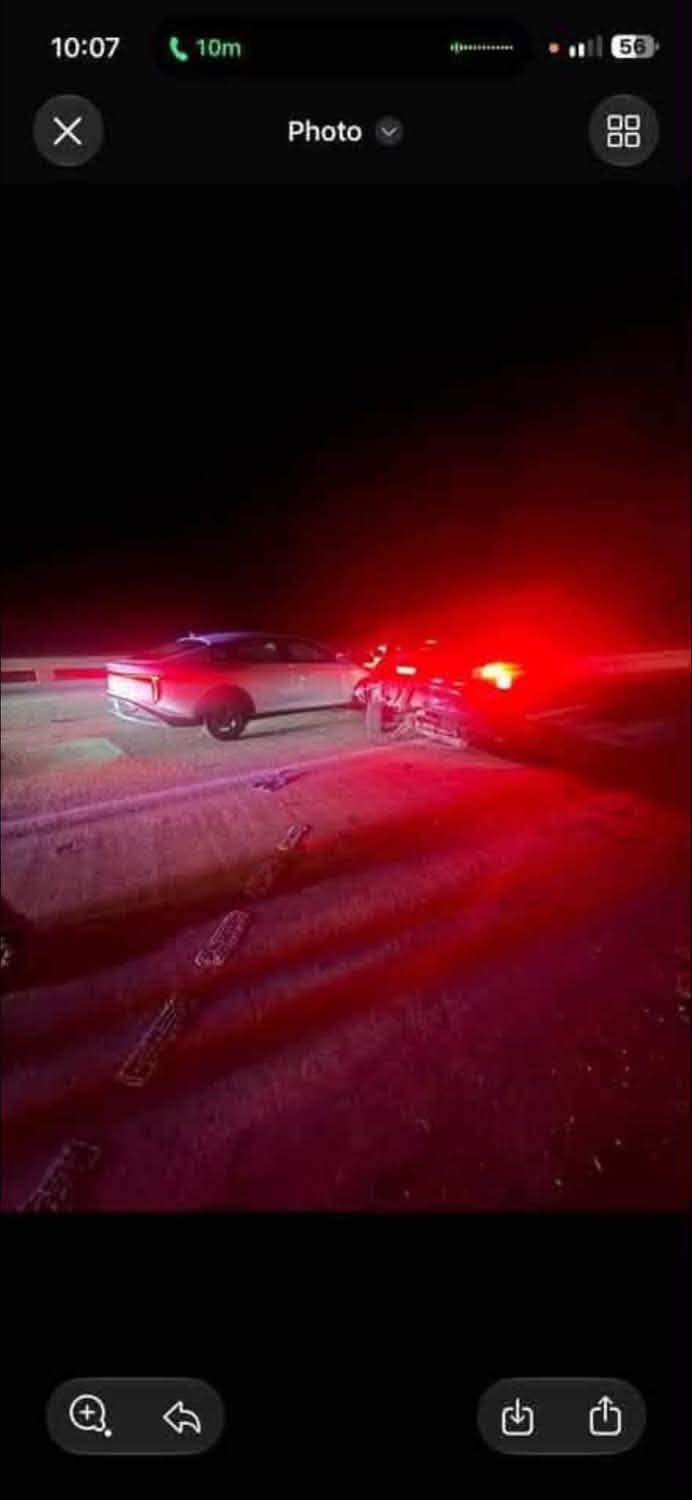 Nighttime photo of the two-vehicle crash scene on I-10