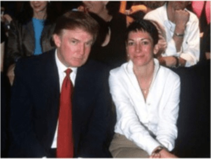 Man in suit with red tie sitting next to woman in white jacket
