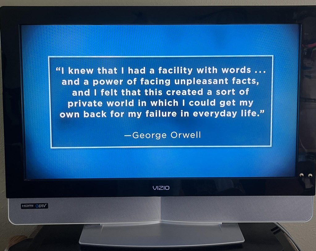 George Orwell quote displayed on blue TV screen